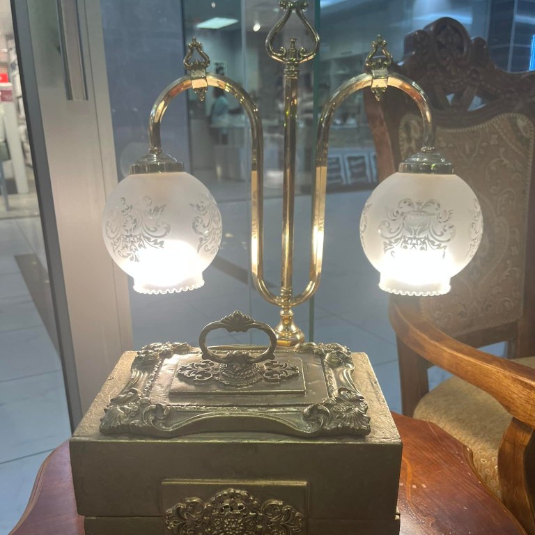 Vintage brass and glass 2-arm library lamp: R3,500; Gilded wooden box with purple velvet inlay: R1,000
