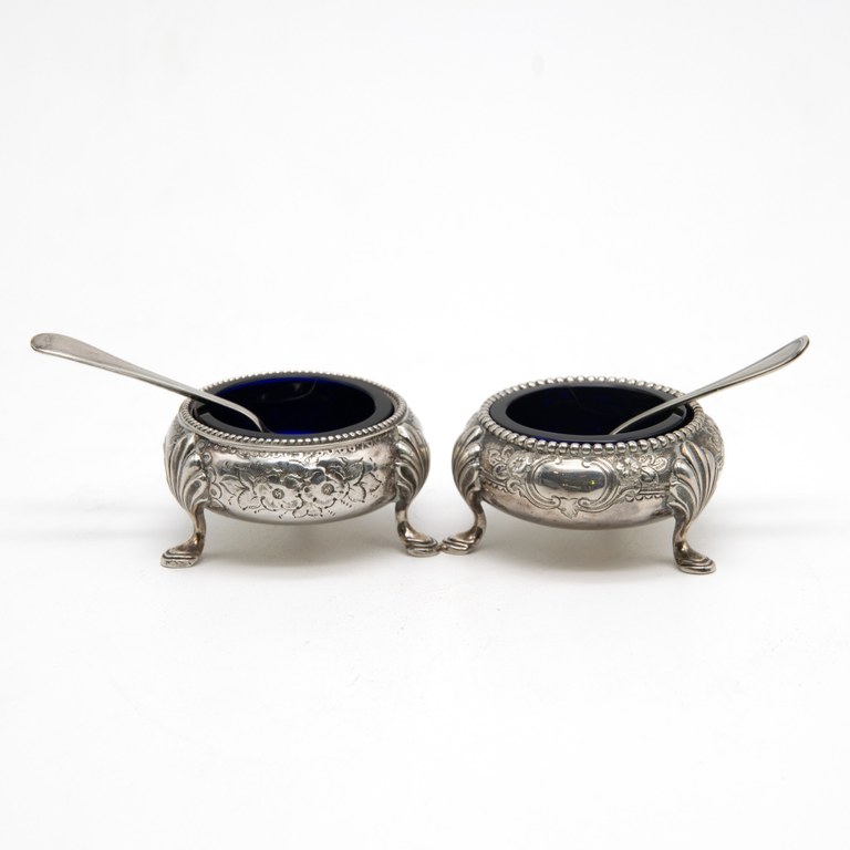 Pair of late 19th century Victorian silver salt sellers with cobalt blue glass inlay and Italian silver serving spoons: R3,000