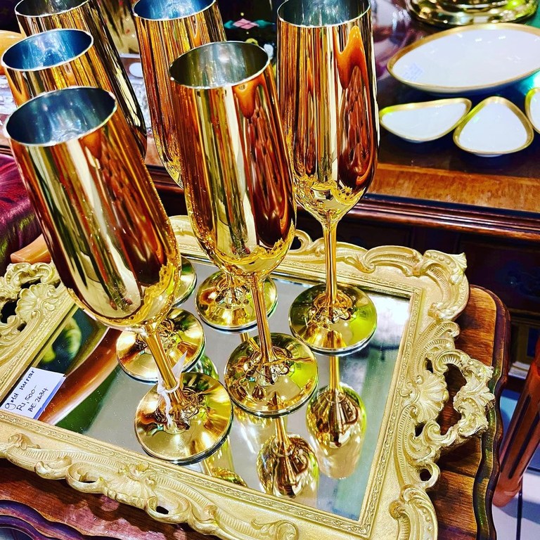 SOLD! Set of 6 gold plated champagne flutes: R6,000 and gilded mirrored tray: R1,500