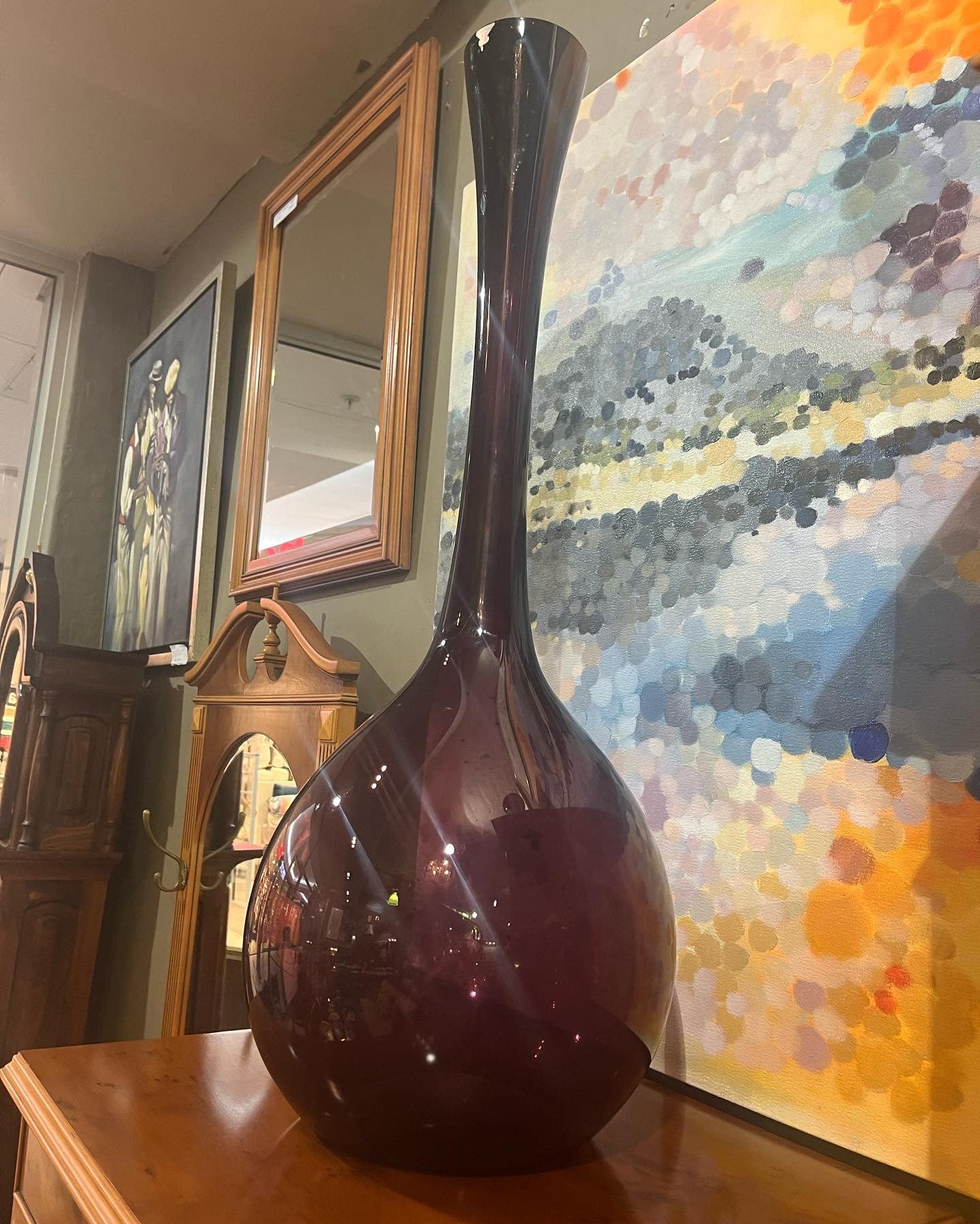 Large Mid-Century Skruf amethyst vase (signed): R6,000 / Art piece: Allison Pilling - Significant sunset with rainbows (oil on canvas): R8,000