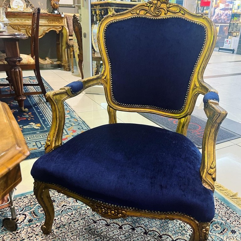 Pair of antique French XV giltwood armchairs with blue velvet upholstery