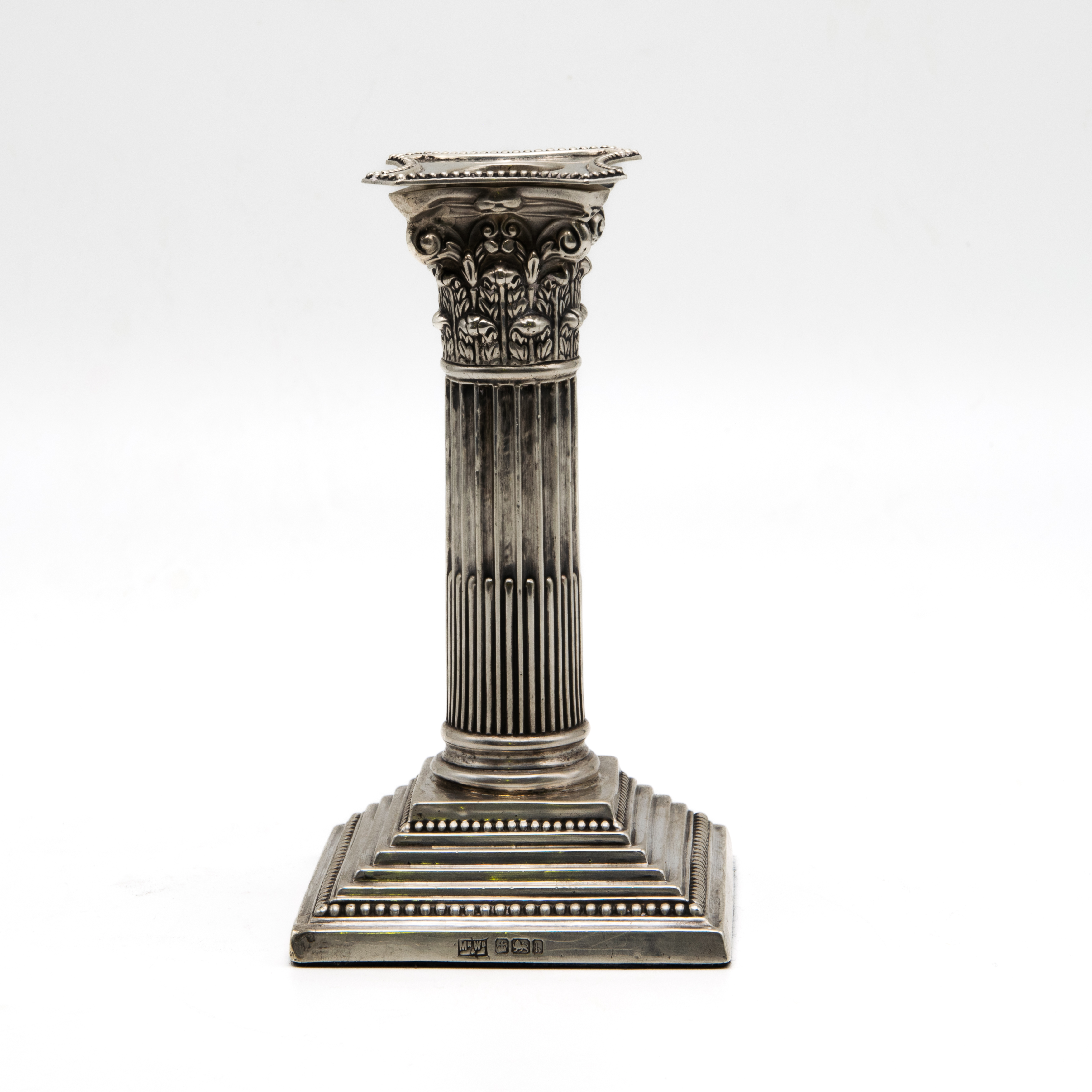 William Hutton & Sons silver Corinthian candle stick, c1900: R2,500