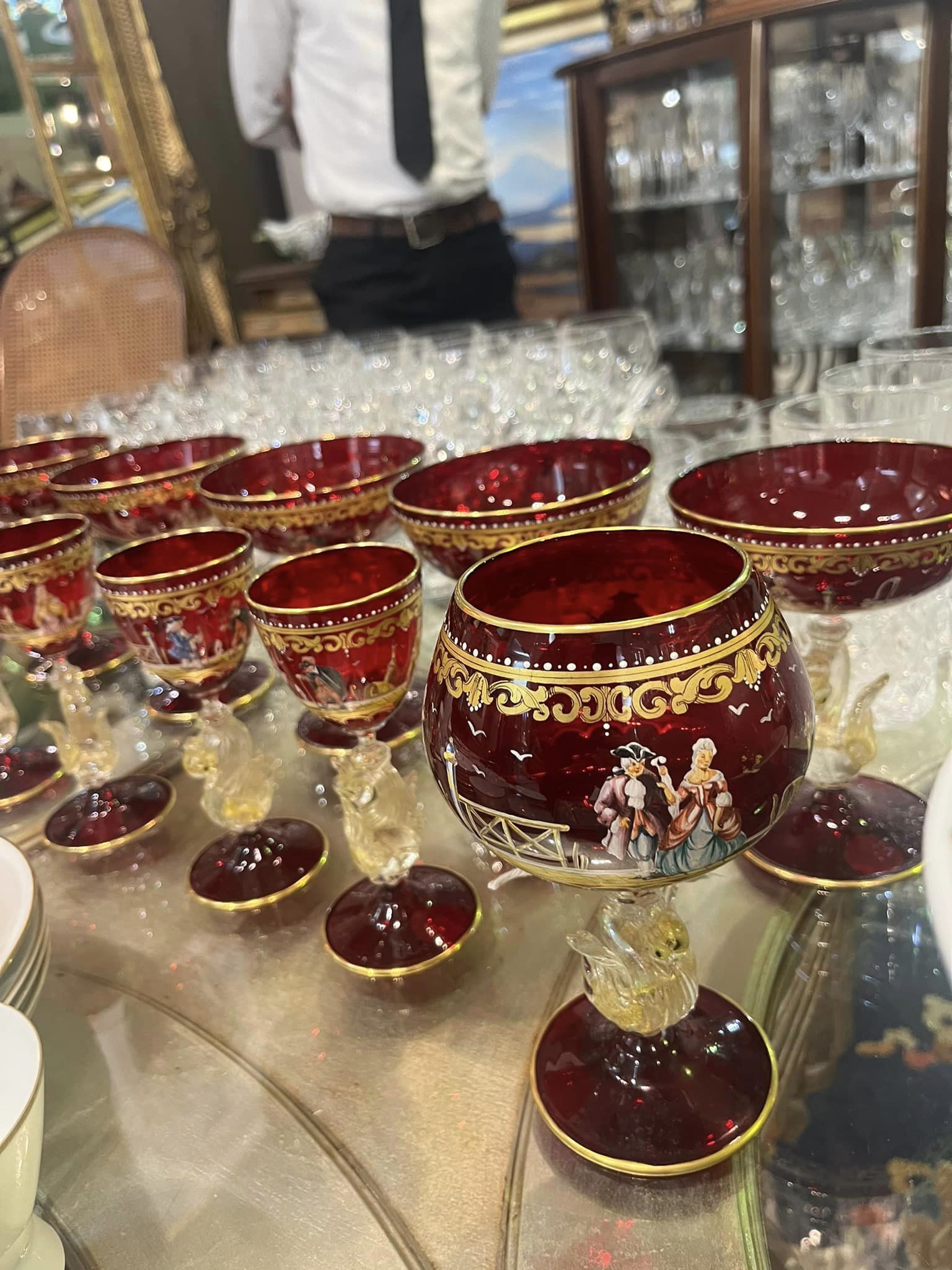 Salaviati and Co. Murano hand painted glassware, the stems in the form of swans and the bowls handpainted, late 19th Century