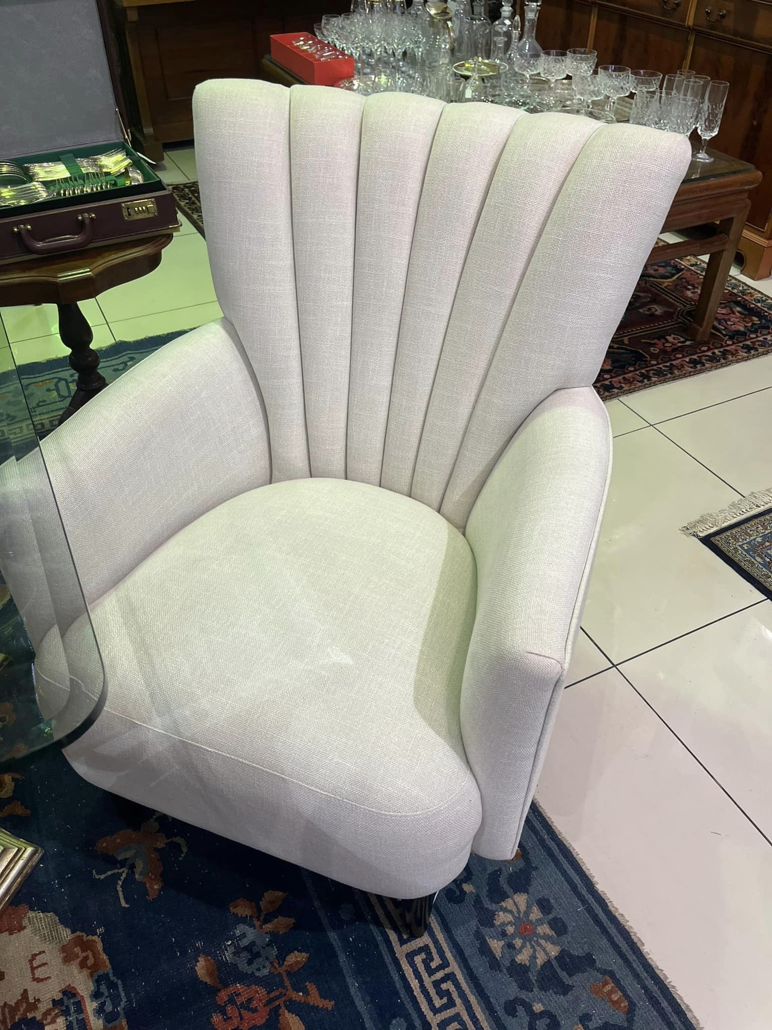 Pair of Art Deco style scalloped wingback chairs