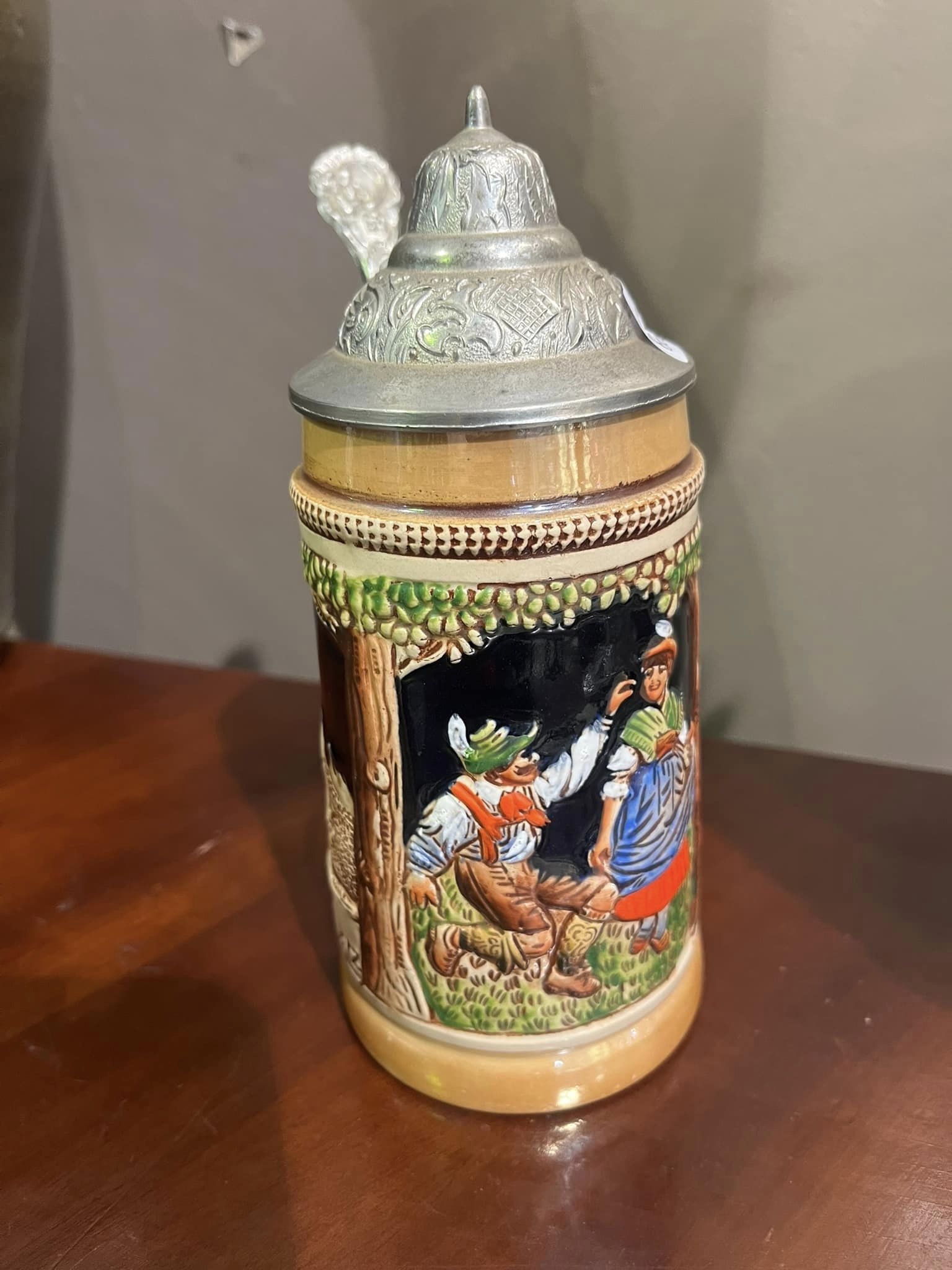 SOLD: “Ein Frohlisch Herz heilt allen Schmerz” - “A happy heart heals all pain” King beer stein, c1970s