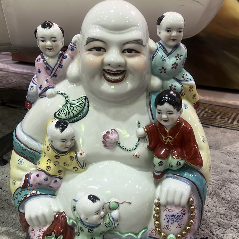 Porcelain laughing buddha