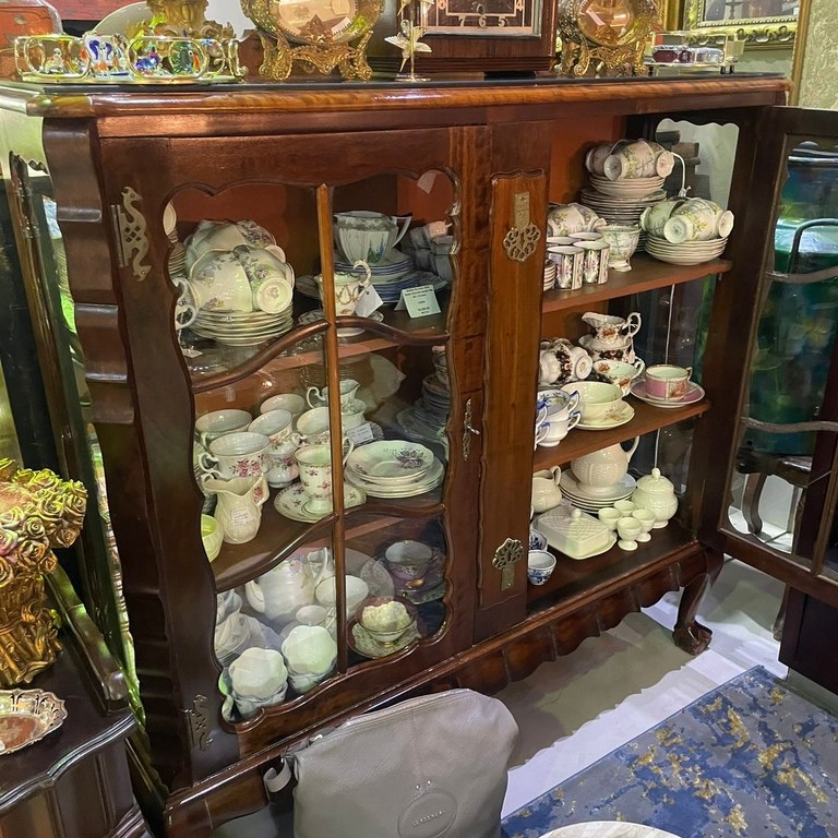 Stinkwood ball & claw display cabinet: R26,000