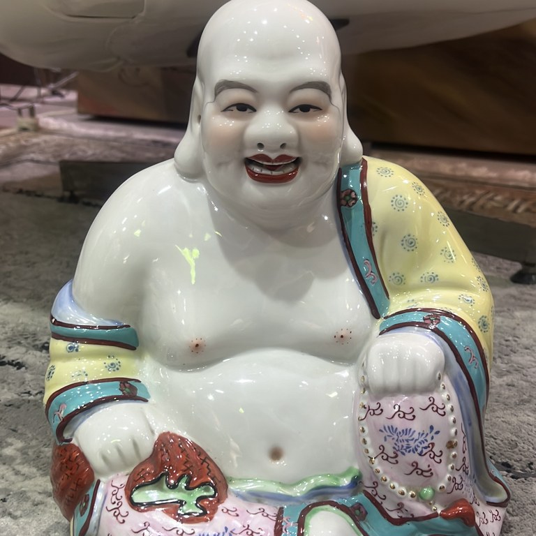 Porcelain laughing buddha