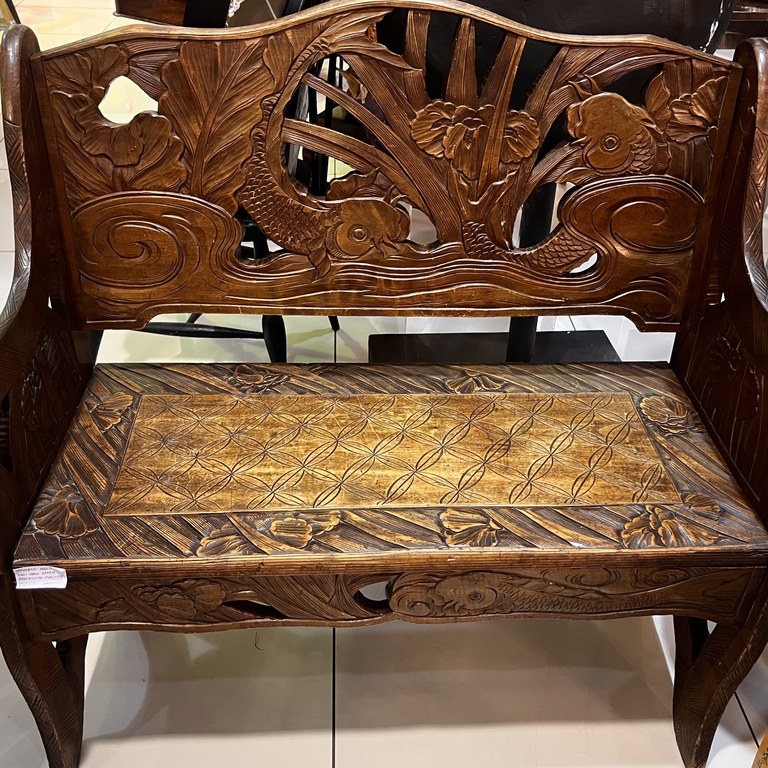 Japanese Meiji-period (circa 1900–1910) intricately carved wooden hall bench