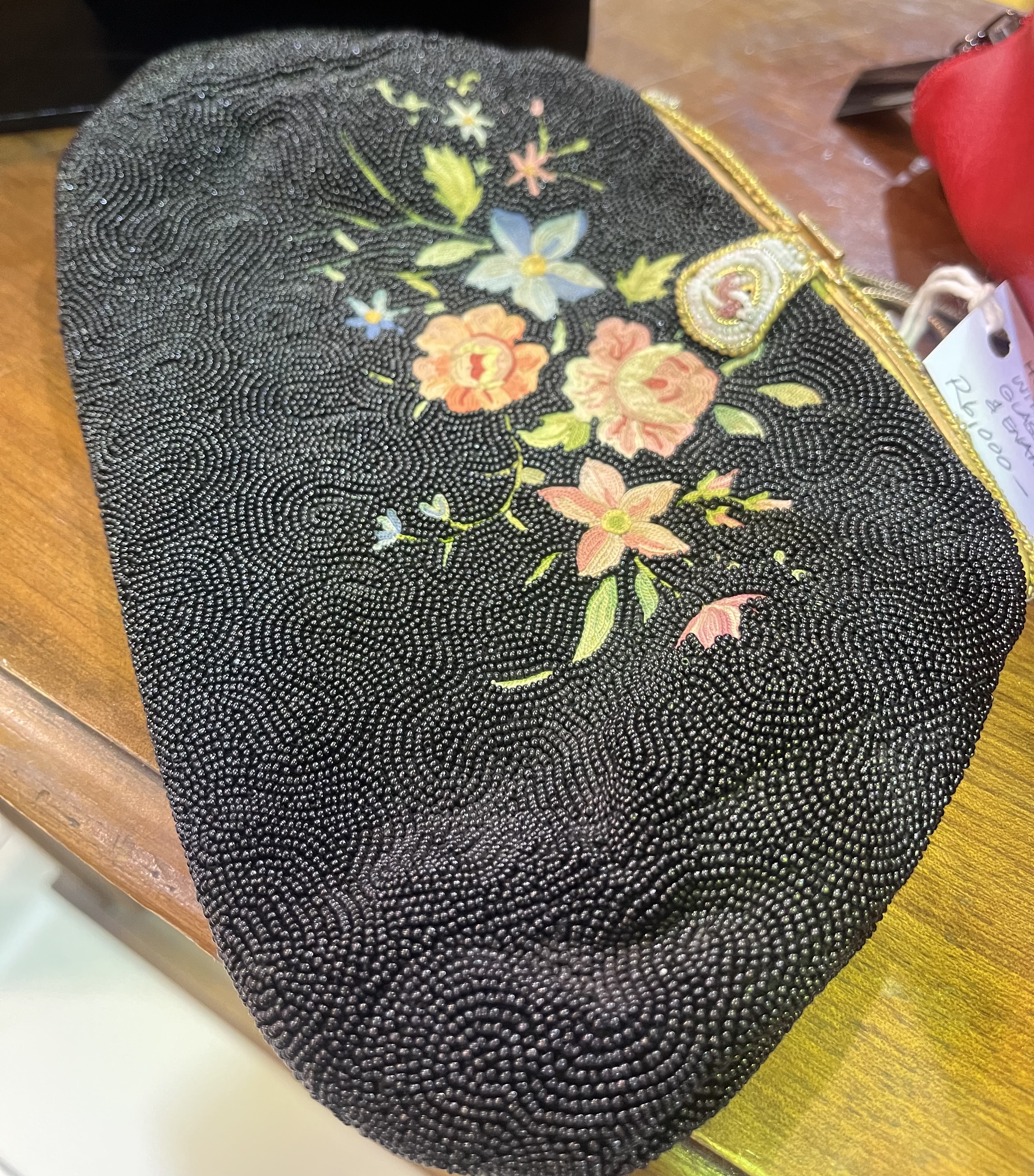 Herve clutch bag with handsewn glass beads, embroidery and enamel work, c1950s