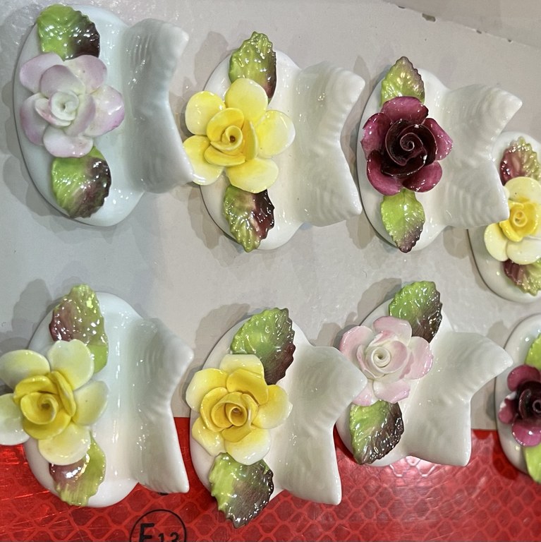 Boxed set of 12 Coalport place card holders: R1,200 Boxed set of 12 Coalport place card holders: R1,200