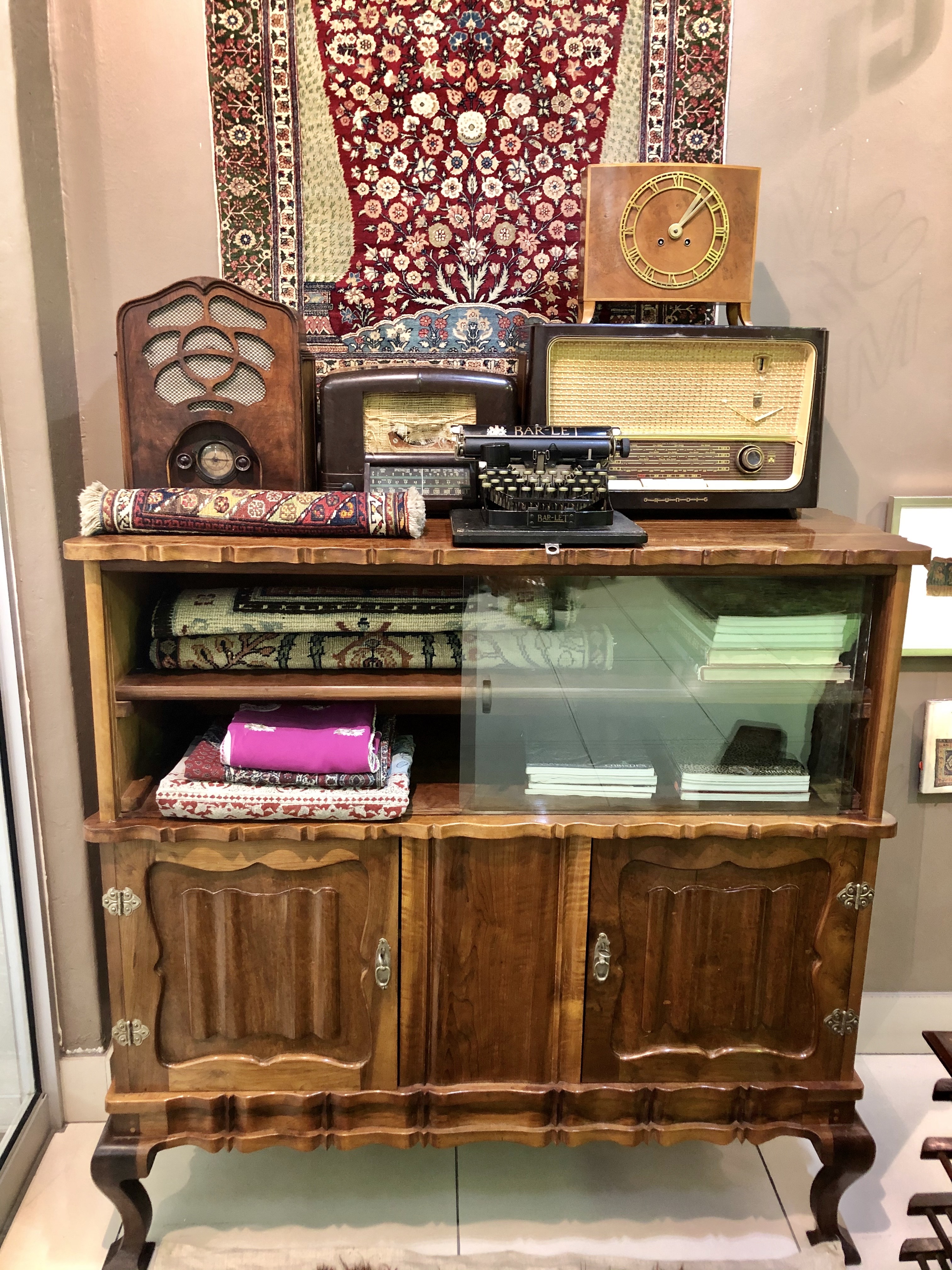 STINKWOOD DISPLAY CABINET MID-20TH CENTURY