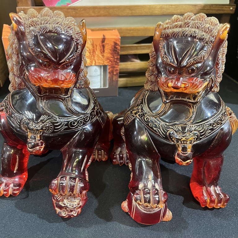 Vintage pair of Chinese amber foo dogs