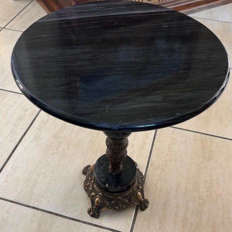 Low table with black marble table top & bronze base: R4,500