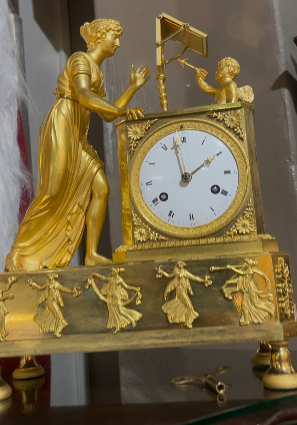 Empire style gilt bronze mantel clock: POR
