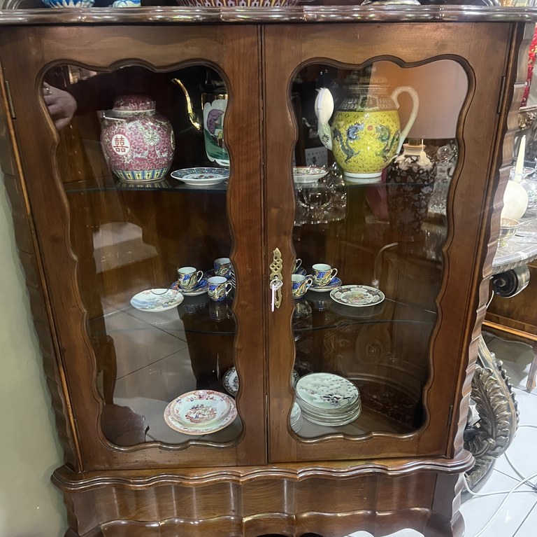 Stinkwood corner ball & claw display cabinet: R20,000