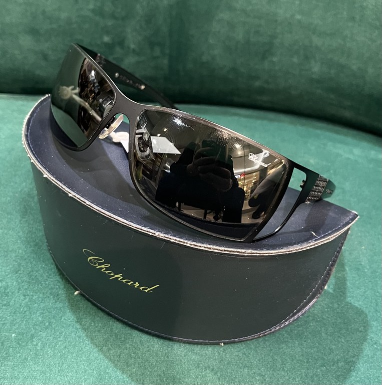 Pair of Chopard wrap-around sunglasses with black tone metal frames, textured black acetate arms