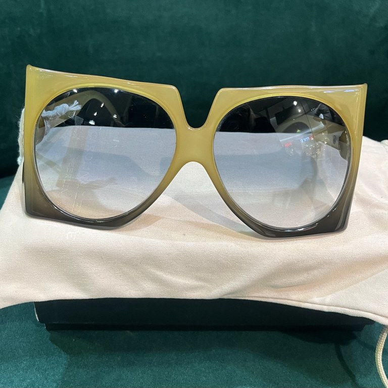 Pair of Christian Dior 1970s D03 Optyl gradient sunglasses, in pale moss green acetate frames, silver and black tone logo to temples