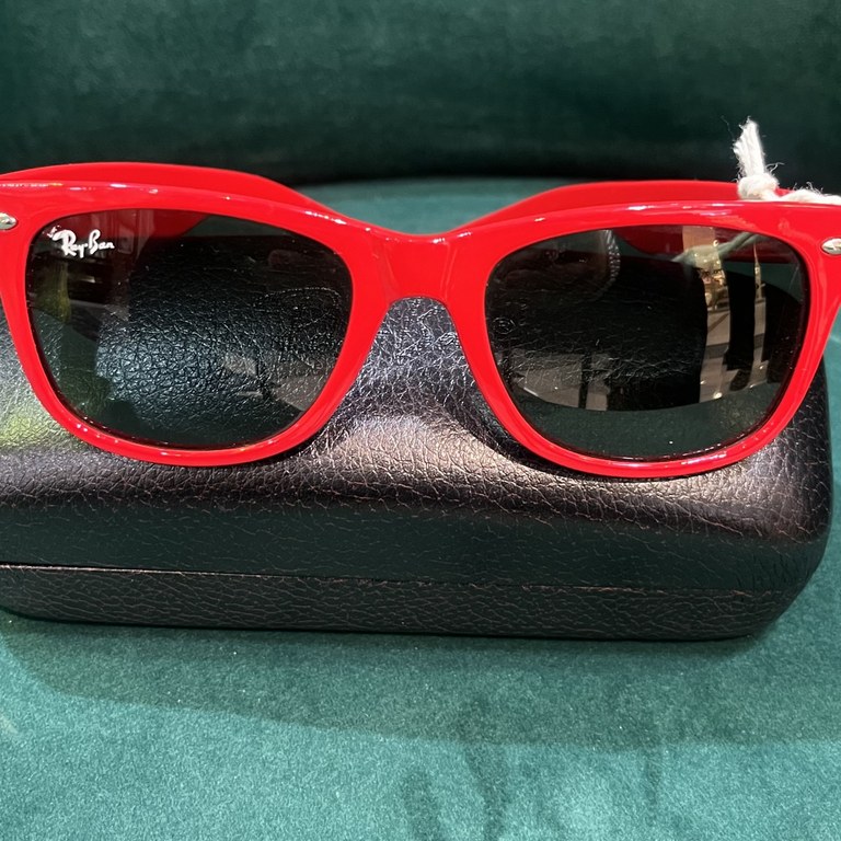 Pair of Ray-Ban Wayfarer sunglasses in red