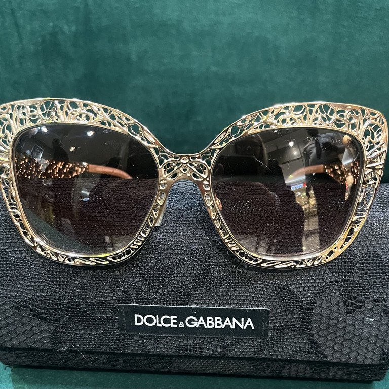 Pair of Docle & Gabbana metal frame sunglasses