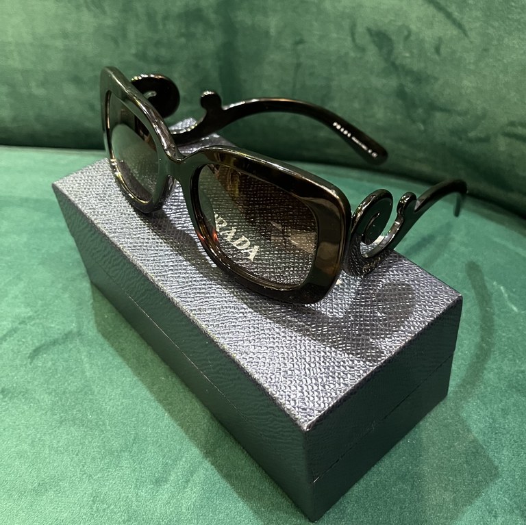 Pair of Prada sunglasses