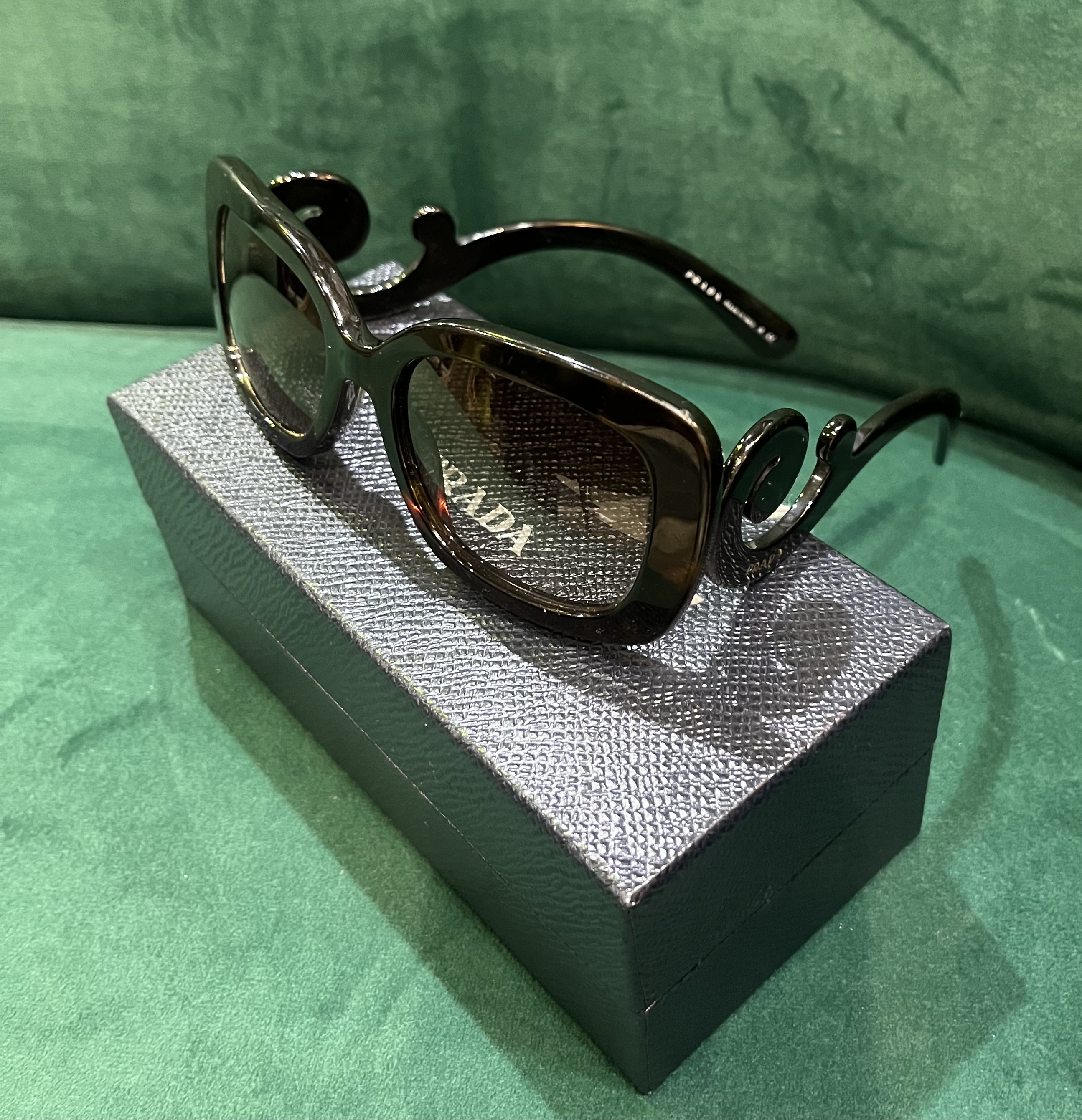 Pair of Prada sunglasses