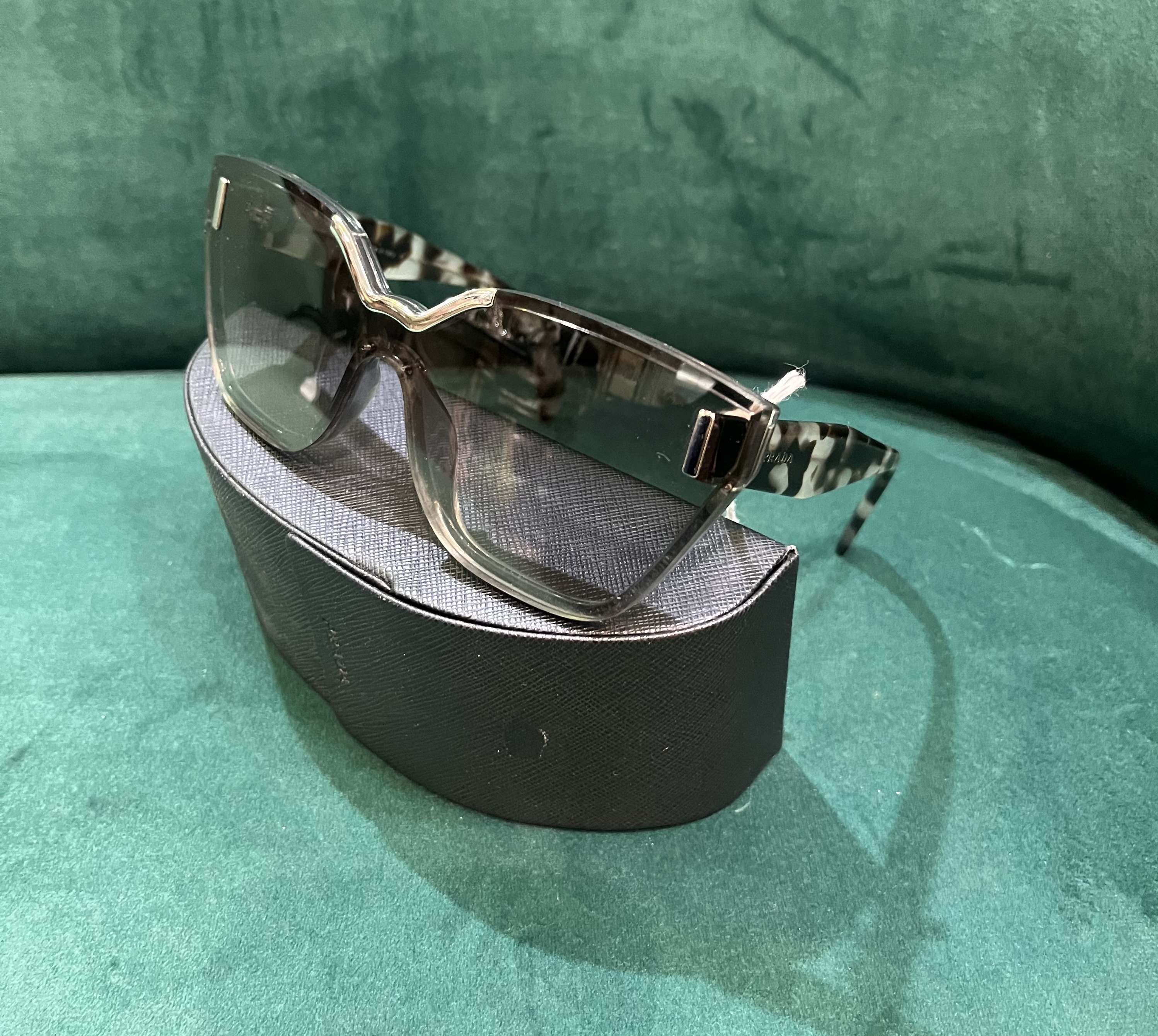 Pair of Prada sunglasses