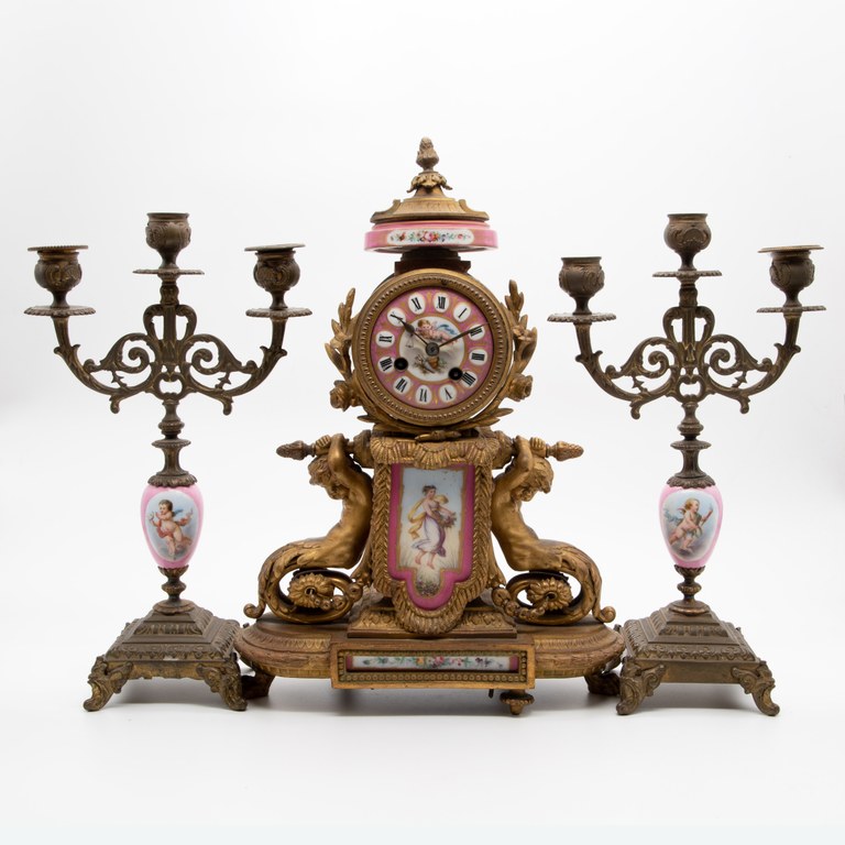 SOLD! French gilded brass and porcelain ormolu mantel clock with a pair of brass and porcelain candle sticks, circa 1900