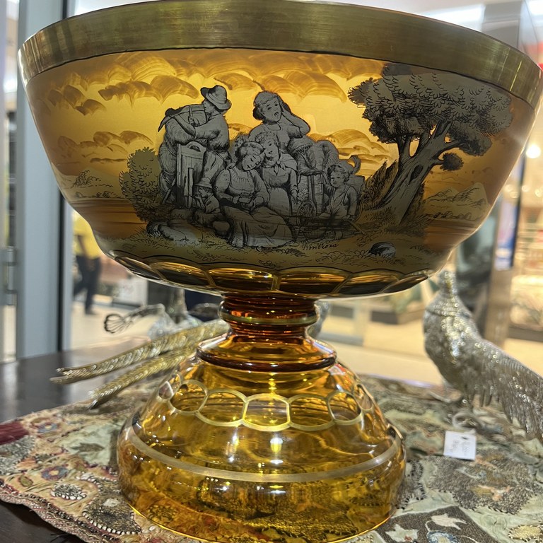 Moser amber glass and gilt footed bowl, decorated with continuous pastoral and figural scenes, signed, 23 x 28 cm