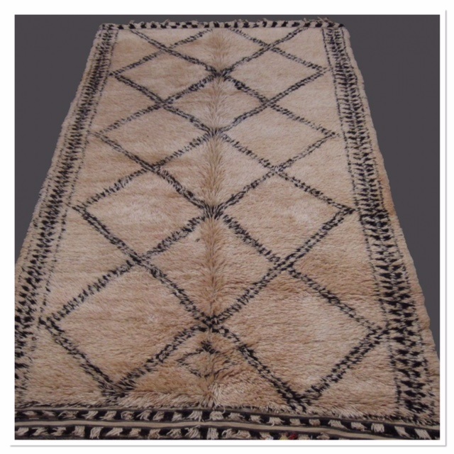 Traditional Beni Ourain Moroccan rug with diamond design