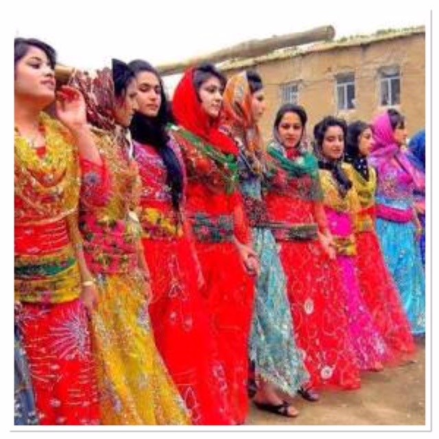 Female members of the Kurdish tribe in their traditional bright and beautiful dresses